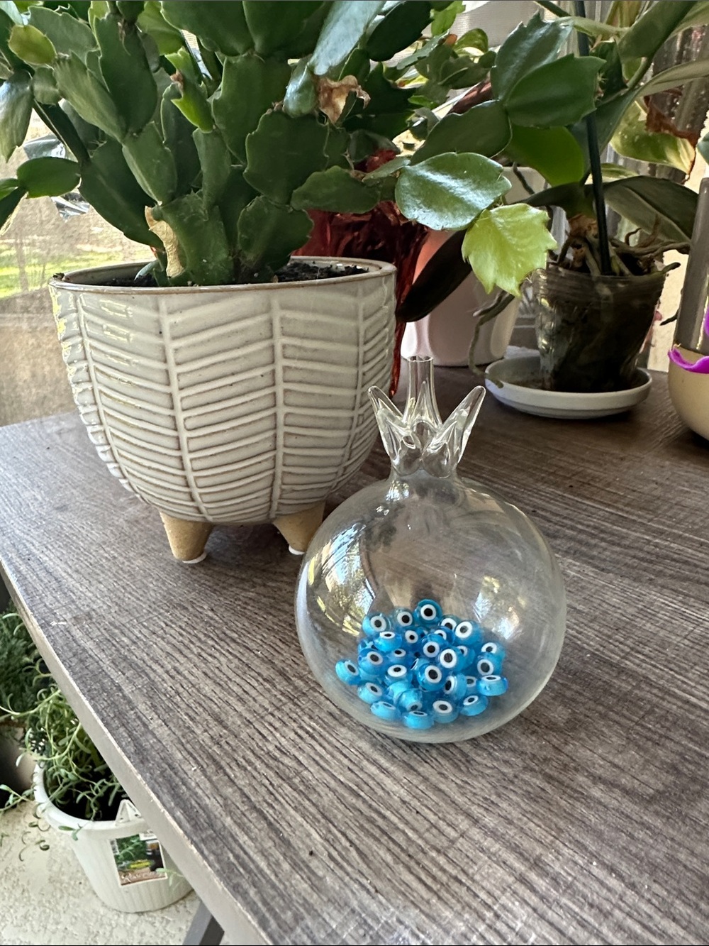 Clear Glass Pomegranate Ornament with Blue Evil Eye Beads
